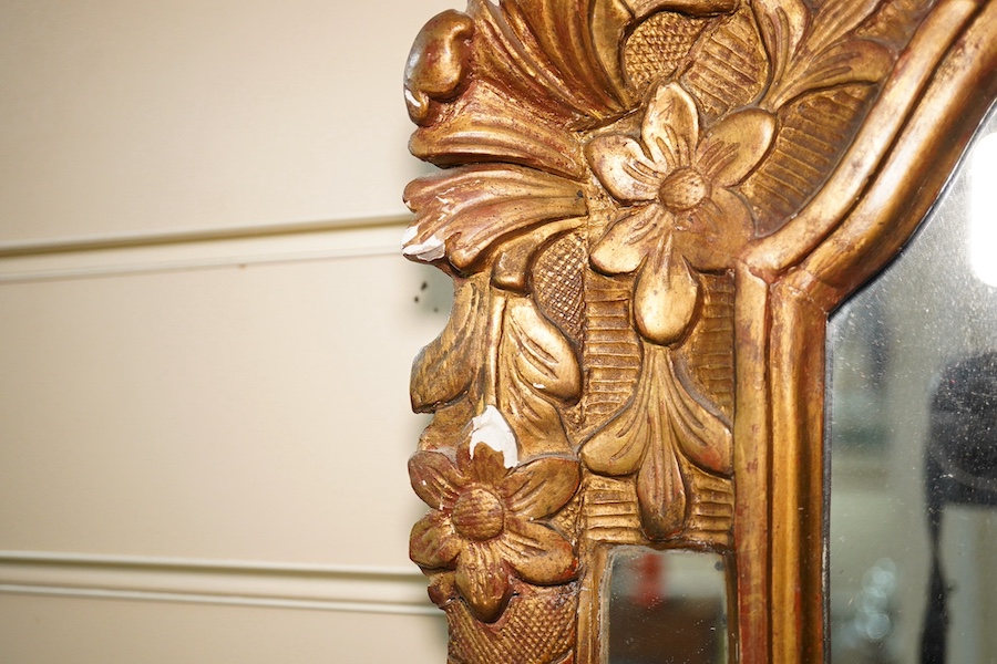 A Victorian gilt gesso mirror with chimney sweep's guild crest. Condition - poor to fair